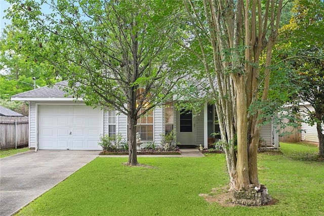 62088 Snow St, Lacombe, LA 70445 - view of property hidden behind natural elements with driveway, an attached garage, and roof with shingles