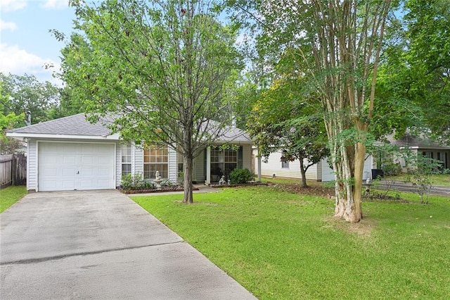 62088 Snow St, Lacombe, LA 70445 - obstructed view of property with asphalt driveway and an attached garage