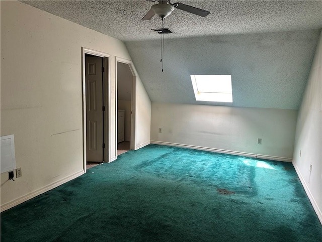 41 Hollycrest Blvd Unit 41, Covington, LA 70434 - bonus room featuring a textured ceiling, lofted ceiling, a skylight, carpet, and a ceiling fan