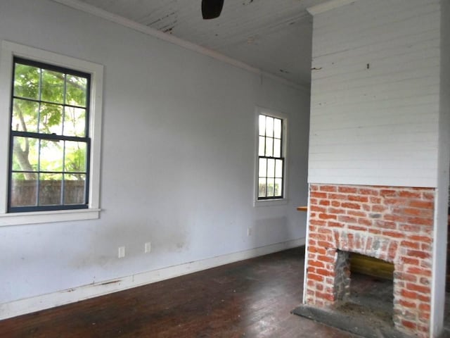 6315 Alhambra St, New Orleans, LA 70117 - unfurnished living room with hardwood / wood-style flooring, plenty of natural light, baseboards, ornamental molding, and ceiling fan