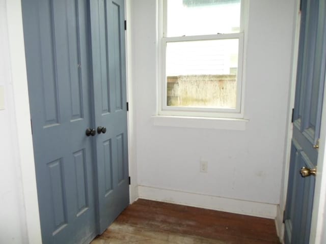 6315 Alhambra St, New Orleans, LA 70117 - doorway with wood finished floors and baseboards