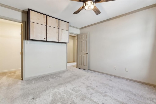 232 Janet Lynn Ct, Theriot, LA 70397 - unfurnished bedroom with ornamental molding, light colored carpet, baseboards, and ceiling fan
