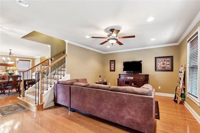 5878 General Diaz St, New Orleans, LA 70124 - living room featuring light wood-style floors, a ceiling fan, baseboards, stairs, and recessed lighting