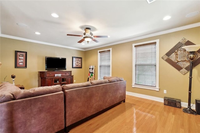 5878 General Diaz St, New Orleans, LA 70124 - living room featuring a ceiling fan, light wood finished floors, baseboards, ornamental molding, and recessed lighting