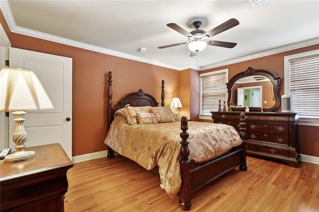5878 General Diaz St, New Orleans, LA 70124 - bedroom featuring baseboards, light wood finished floors, ornamental molding, and a ceiling fan