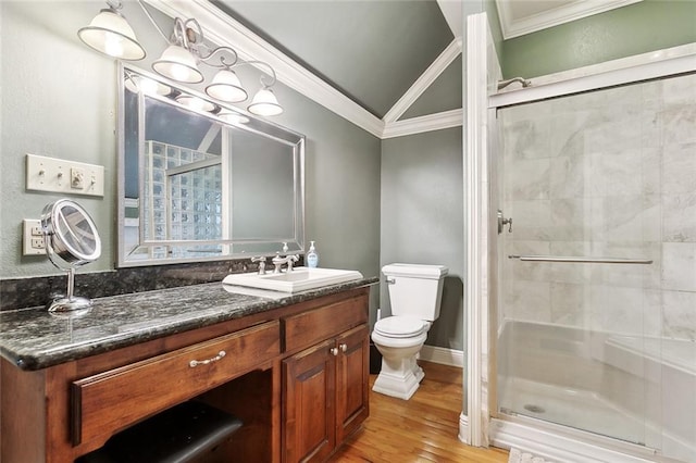 5878 General Diaz St, New Orleans, LA 70124 - full bath featuring a stall shower, crown molding, toilet, wood finished floors, and vanity