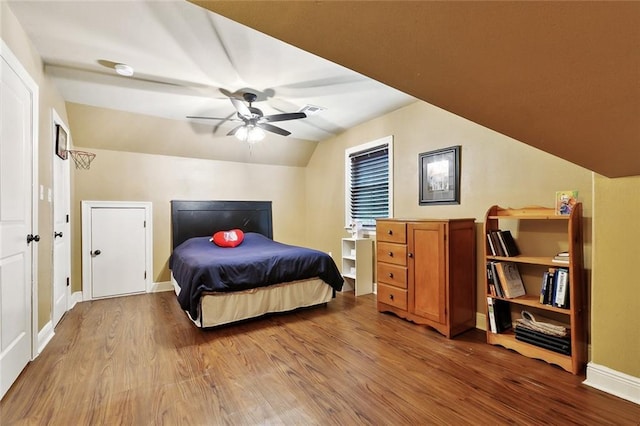 5878 General Diaz St, New Orleans, LA 70124 - bedroom with wood finished floors, vaulted ceiling, baseboards, and ceiling fan
