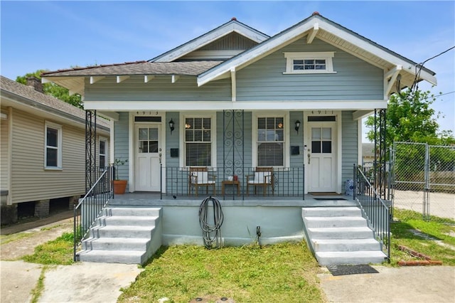 491113 Willow St, New Orleans, LA 70115 - view of front of house with a porch