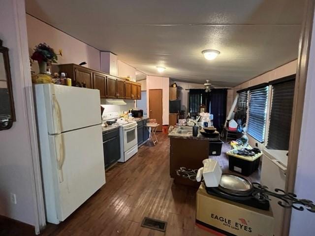 36241CENTRALAVENUE Central Ave, Pearl River, LA 70452 - kitchen with white appliances, dark wood-style floors, and under cabinet range hood