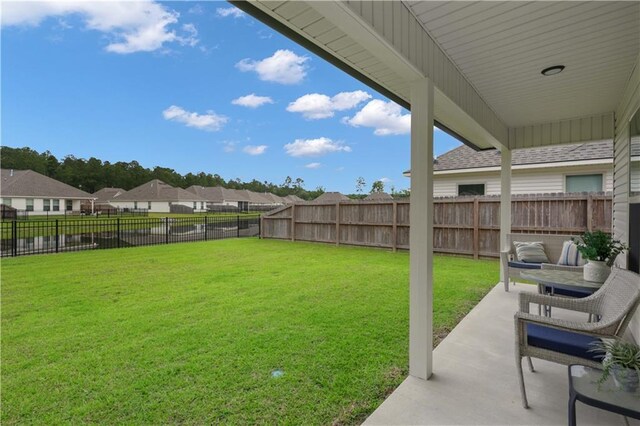 11537 Woodbluff Dr, Covington, LA 70433 - view of yard featuring a patio area