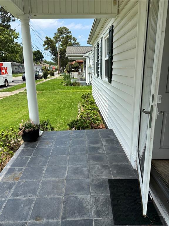 905 Lurline Dr, Jefferson, LA 70121 - covered porch featuring a lawn