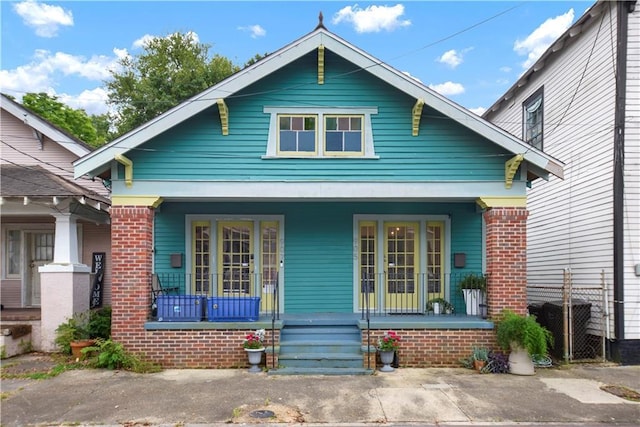 905-907 Pelican Ave, New Orleans, LA 70114 - view of front of property featuring covered porch