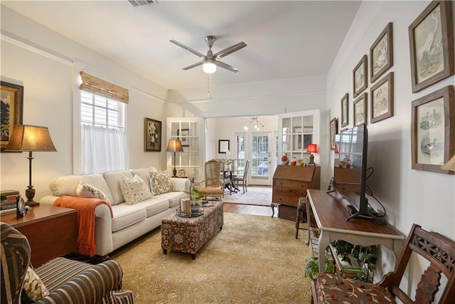 905-907 Pelican Ave, New Orleans, LA 70114 - living room featuring ceiling fan and wood finished floors