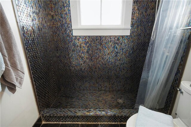 905-907 Pelican Ave, New Orleans, LA 70114 - full bathroom with toilet and a stall shower