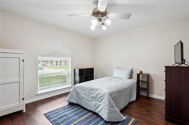 1112 Michigan Ave, Kenner, LA 70062 - bedroom with wood finished floors, baseboards, and a ceiling fan