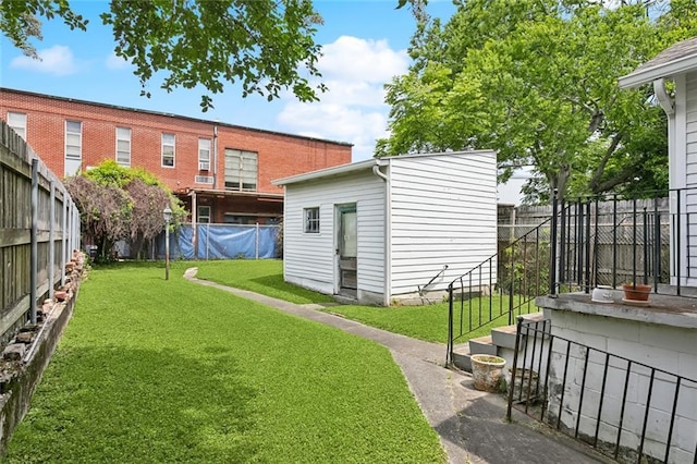 115 N Scott St, New Orleans, LA 70119 - view of yard with an outdoor structure