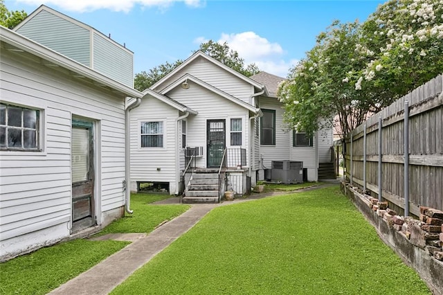 115 N Scott St, New Orleans, LA 70119 - back of house with central air condition unit