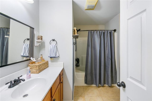 28272 Lake Salvador Dr, Livingston, LA 70754 - full bath featuring vanity, tile patterned flooring, and shower / bathtub combination with curtain