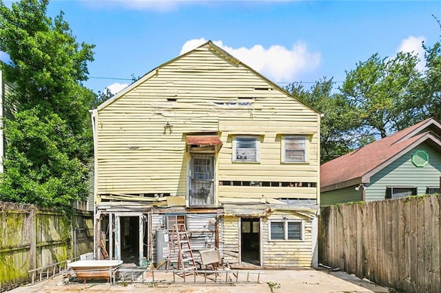 1534 N Dorgenois St, New Orleans, LA 70119 - back of house featuring a fenced backyard and a patio
