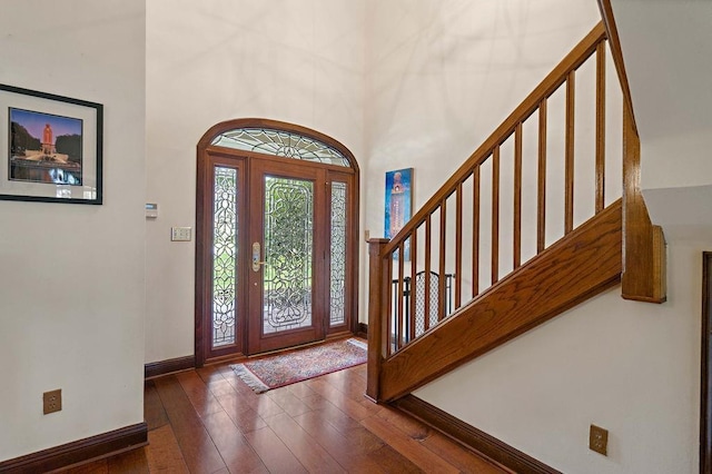 553 Beau Chene Dr, Mandeville, LA 70471 - foyer entrance with hardwood / wood-style floors and stairway