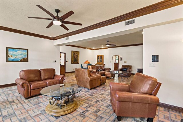 553 Beau Chene Dr, Mandeville, LA 70471 - living area featuring a ceiling fan, brick patterned floors, and ornamental molding