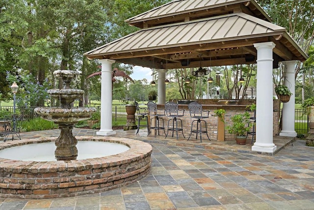 553 Beau Chene Dr, Mandeville, LA 70471 - view of patio featuring a gazebo and an outdoor bar