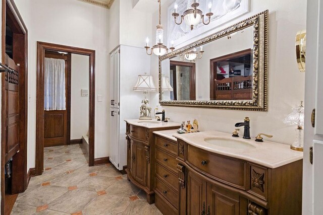 553 Beau Chene Dr, Mandeville, LA 70471 - full bathroom with a chandelier and vanity