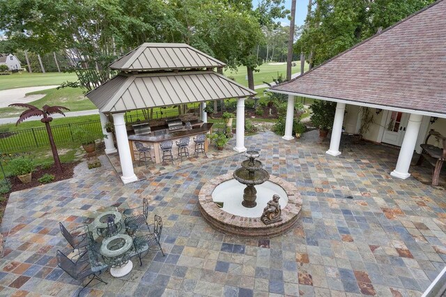 553 Beau Chene Dr, Mandeville, LA 70471 - view of patio with a gazebo and view of golf course