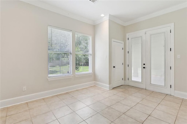 47075 Weald Way, Hammond, LA 70401 - unfurnished bedroom featuring crown molding, light tile patterned floors, baseboards, and french doors