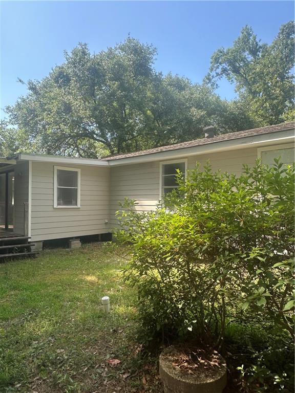 25594 W Spruce St, Lacombe, LA 70445 - view of side of home