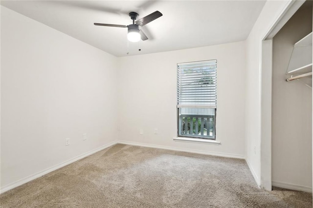 640 Tete Lours Dr Unit 28, Mandeville, LA 70471 - carpeted spare room featuring a ceiling fan and baseboards