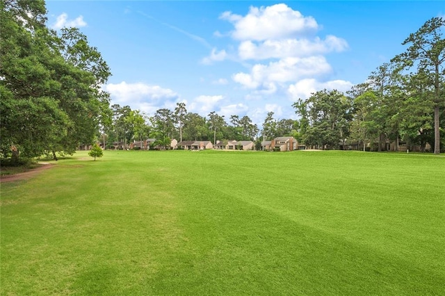 640 Tete Lours Dr Unit 28, Mandeville, LA 70471 - view of grassy yard