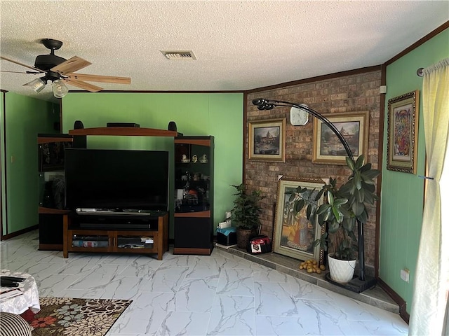 4300 Idaho Ave, Kenner, LA 70065 - living area with marble look tiles, a textured ceiling, ceiling fan, a brick fireplace, and crown molding
