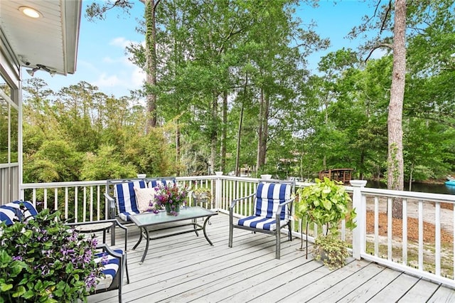 27044 Lucille Dr, Lacombe, LA 70445 - wooden deck with view of scattered trees