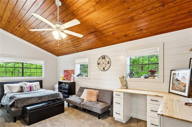 27044 Lucille Dr, Lacombe, LA 70445 - bedroom with wooden ceiling, light colored carpet, multiple windows, vaulted ceiling, and wood walls