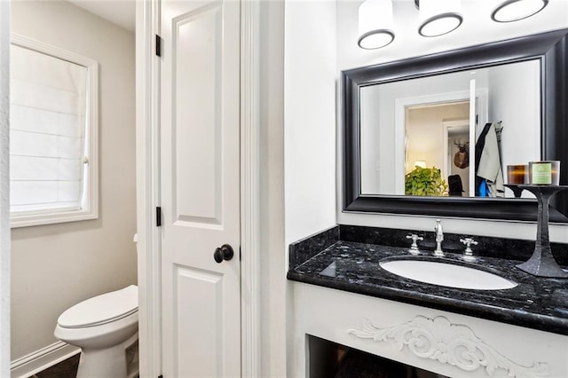 27044 Lucille Dr, Lacombe, LA 70445 - bathroom with vanity and toilet