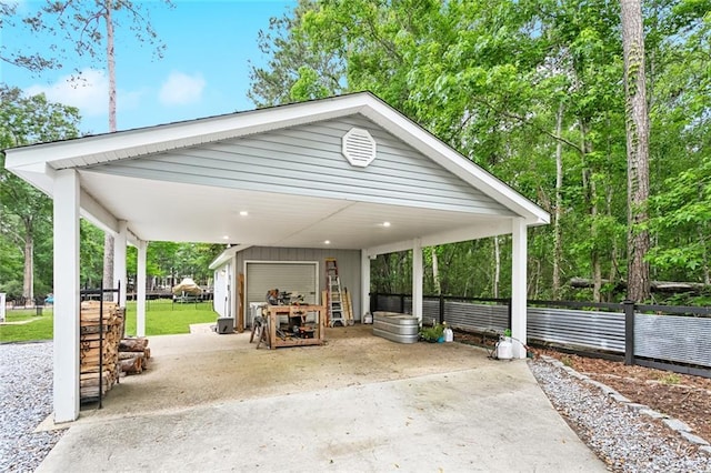 27044 Lucille Dr, Lacombe, LA 70445 - view of patio / terrace with a detached garage and an outdoor structure