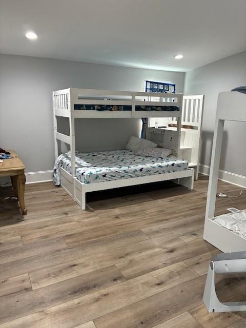 131 Verley Ln, Grand Isle, LA 70358 - bedroom with light wood-type flooring, baseboards, and recessed lighting