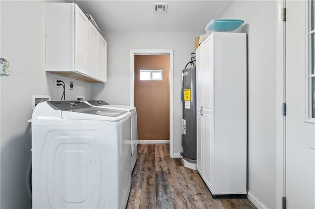 326 Barton Ave, Luling, LA 70070 - laundry room with washer and dryer, electric water heater, cabinet space, wood finished floors, and baseboards