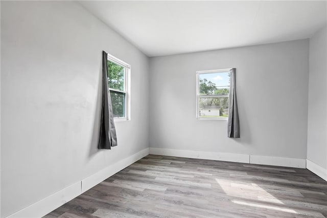 326 Barton Ave, Luling, LA 70070 - spare room featuring healthy amount of natural light, baseboards, and wood finished floors