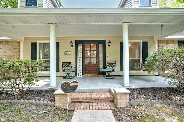 21360 Stire St, Abita Springs, LA 70420 - property entrance featuring covered porch