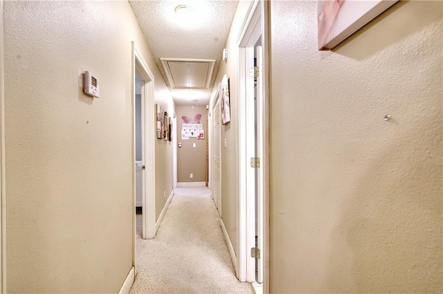 21360 Stire St, Abita Springs, LA 70420 - hall featuring attic access, light colored carpet, and baseboards