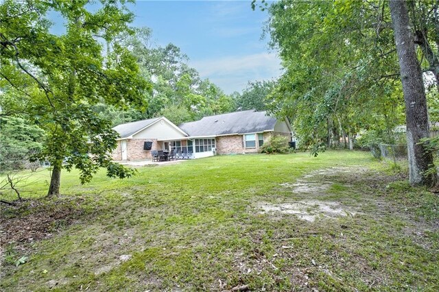 21360 Stire St, Abita Springs, LA 70420 - back of property featuring a patio