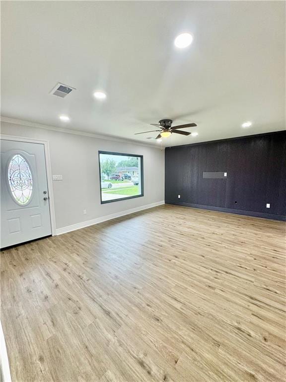 3805 Purdue Dr, Metairie, LA 70003 - entrance foyer featuring plenty of natural light, a ceiling fan, light wood-style floors, baseboards, and ornamental molding