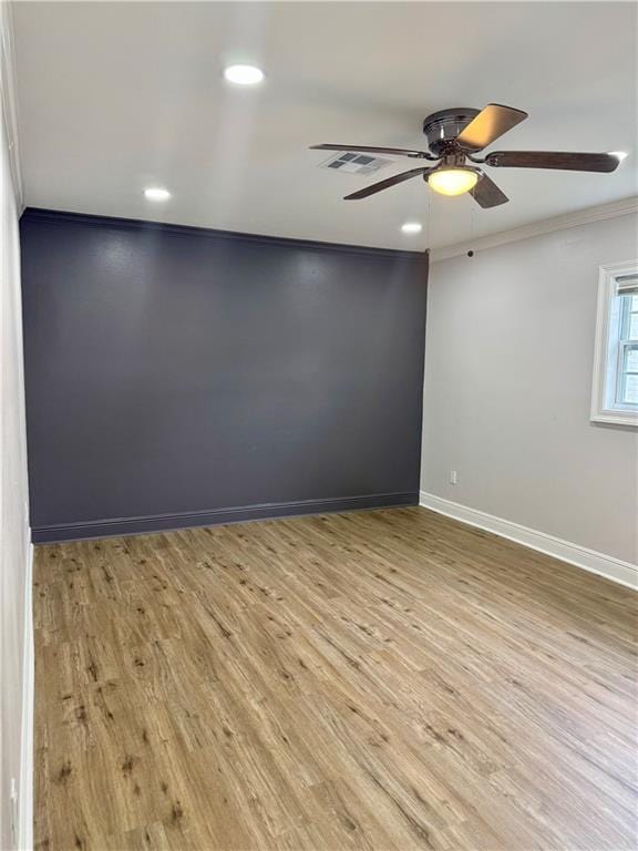 3805 Purdue Dr, Metairie, LA 70003 - spare room with ceiling fan, crown molding, baseboards, wood finished floors, and recessed lighting