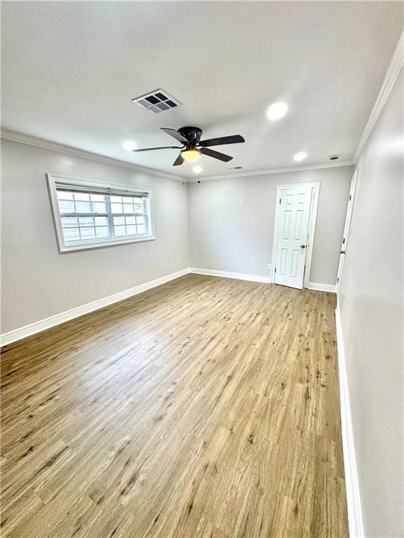 3805 Purdue Dr, Metairie, LA 70003 - empty room featuring crown molding, light wood finished floors, baseboards, ceiling fan, and recessed lighting