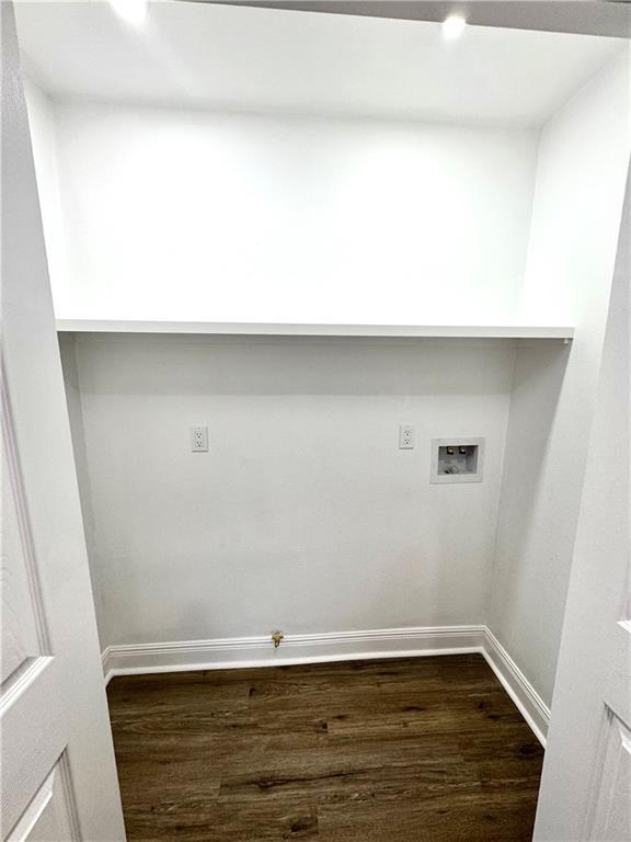 3805 Purdue Dr, Metairie, LA 70003 - washroom featuring washer hookup, dark wood-style floors, and baseboards