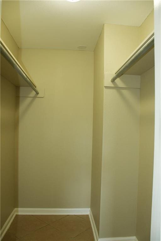 6 Marywood Ct, New Orleans, LA 70128 - walk in closet featuring tile patterned floors