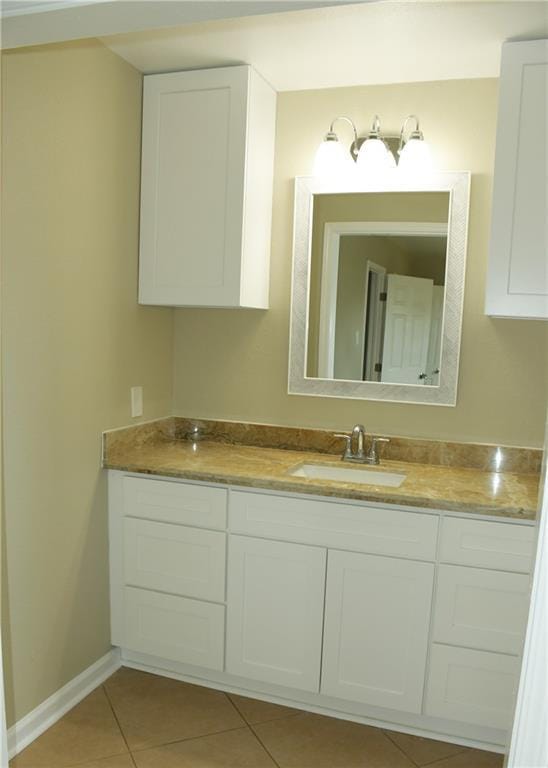 6 Marywood Ct, New Orleans, LA 70128 - bathroom featuring vanity, tile patterned flooring, and baseboards