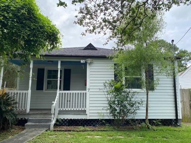 7 Labarre Pl, Jefferson, LA 70121 - view of front of property with covered porch and roof with shingles